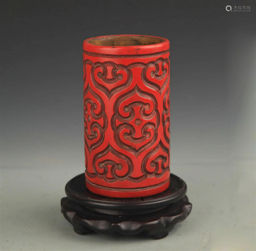 A FINE RED CARVED LACQUER PEN HOLDER