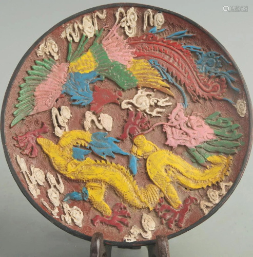 A FINE COLORED RED CARVED LACQUER DRAGON PLATE