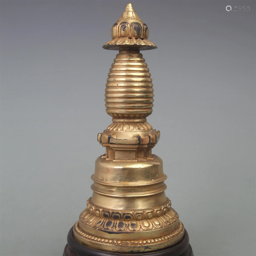 A FINE BRONZE STUPA