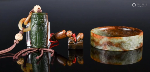 A Group of Three Chinese Incised Jade Carvings