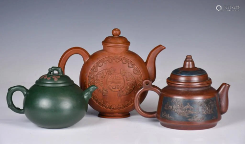 A Group of Three Zisha Teapots