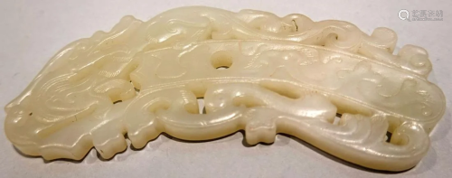 A white jade pendant with ChiLong design.