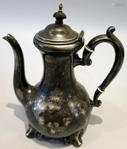A 925 sterling silver kettle.