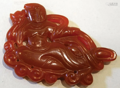 A red-agate flying-goddess.