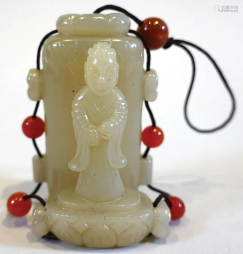 An imperial Hotan greenish-white jade figure of GuanYin and ...