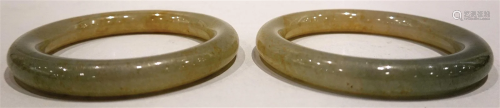 Pair of greenish-white jade bangles.