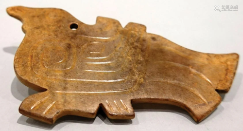 A jade bird-shaped pendant. Western Zhou Dynasty.