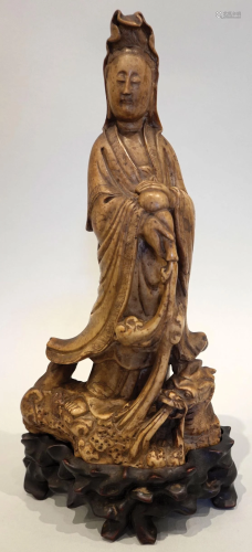 A soapstone carved figure of GuanYin