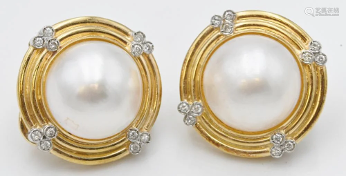 Pair of 14 Karat Gold Round Earrings, having round pearls an...