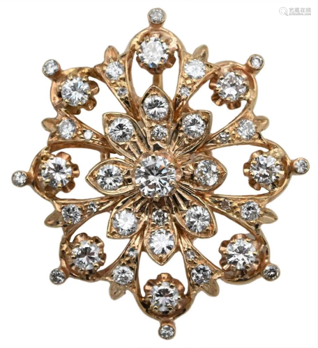 18 Karat Gold Diamond Pendant, having 33 diamonds totaling a...