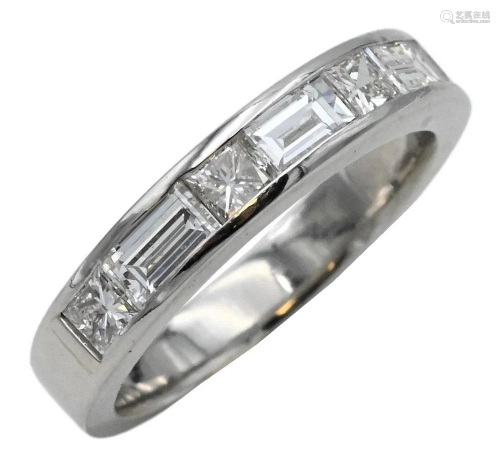 Platinum Ring, set with four princess cut and three baguette...