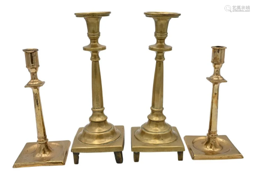 Two Pairs of Early Brass Candlesticks, having square bases o...