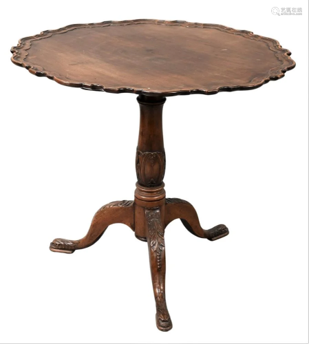 Mahogany Tip Table, having pie crust edge on carved pedestal...