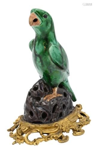 Chinese Porcelain Parrot, green glazed on brown rock form ba...