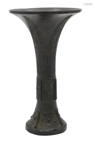 Chinese Bronze Gu, drinking vessel decorated in typical Shan...