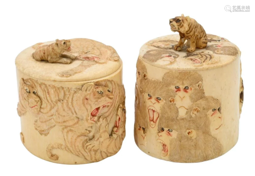 Two Japanese Carved Covered Boxes, each carved with tiger an...