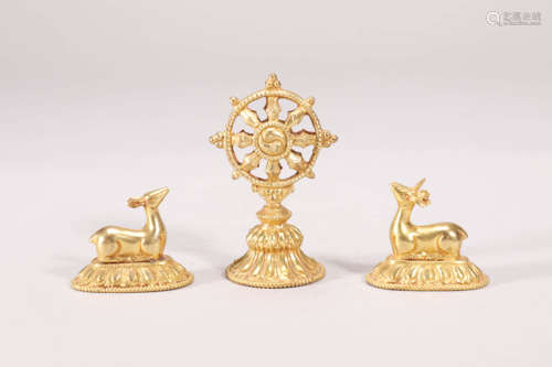 Group of Gilt-Bronze Buddhist Wheels