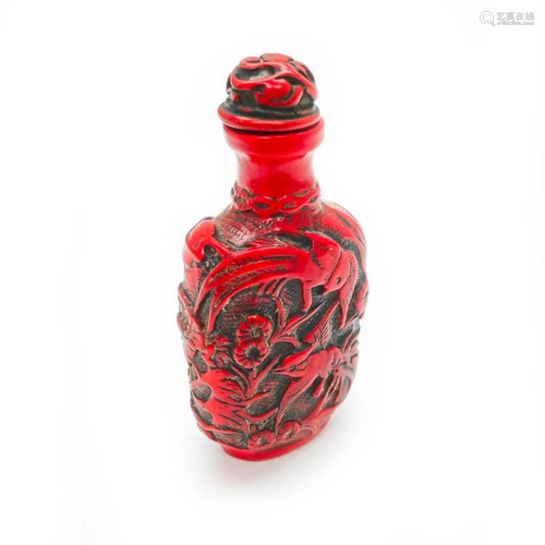 ASIAN CARVED CINNABAR SNUFF BOTTLE WITH STOPPER