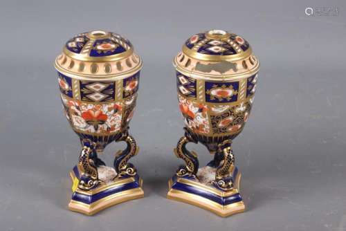 A pair of Davenport Imari decorated pot-pourri vases and cov...