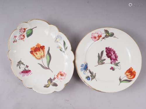 Three early 19th century floral enamelled dessert plates and...
