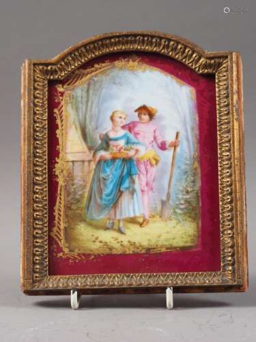 An early 19th century porcelain plaque with gardener figures...
