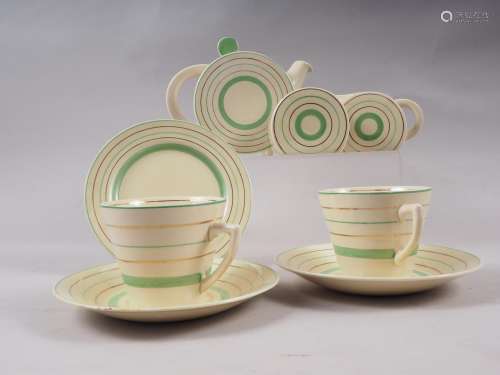 A Clarice Cliff green and gilt stripe decorated cabaret set