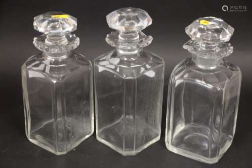 A set of three 19th century cut glass spirit decanters, 10 h...