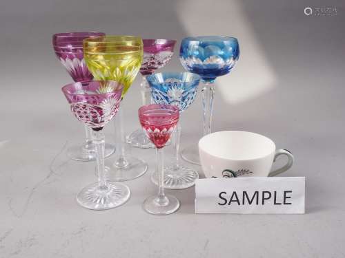 Seven coloured and engraved wine glasses, various, and a set...