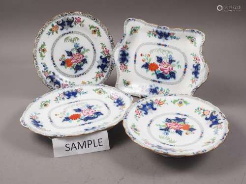 A Minton part dessert service with floral and scrolled decor...