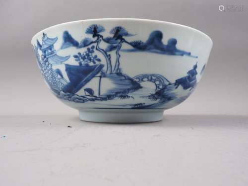 A 19th century Chinese porcelain bowl, decorated buildings, ...