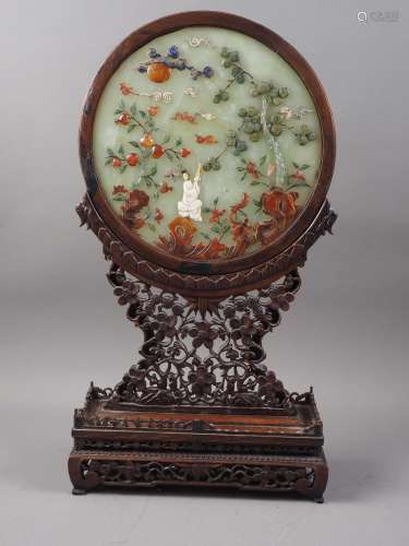 A Chinese circular jade and hardstone inlaid table screen, o...