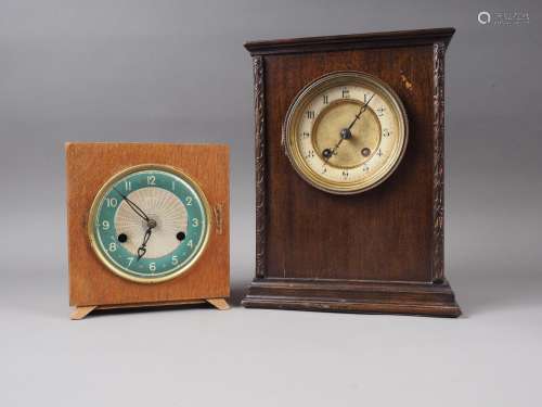 An early 20th century mahogany cased mantel clock with ename...