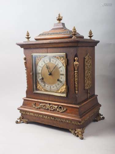 An American mantel clock with brass applied decoration and f...
