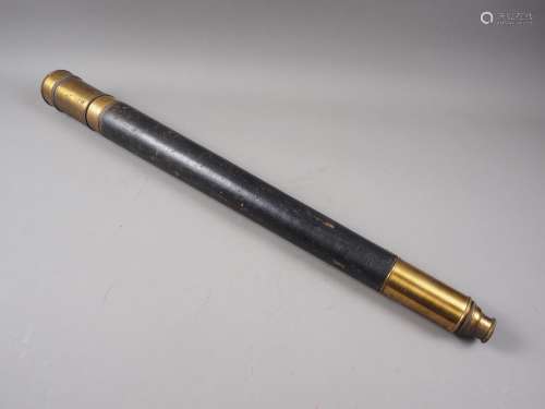 A 19th century brass single-draw telescope with leather oute...