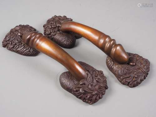 A pair of patinated cast bronze urological door handles, 12 ...