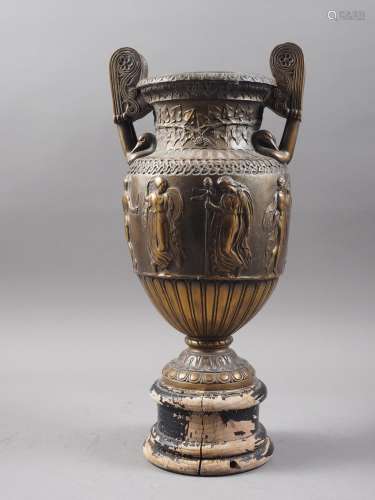 An anodised brass urn with relief Greek classical decoration...