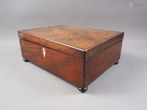A mahogany converted jewellery box, on bun feet, 13 1/2 wide...