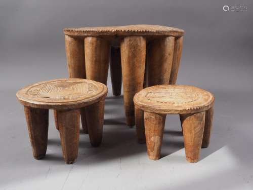 Three mid 20th century Nigerian hardwood (iroko) Nupe stools...