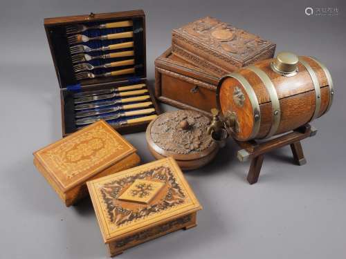 A hardwood puzzle cigarette box with carved dragon decoratio...