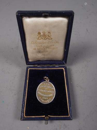 A cased silver HMS Ophir medal, dated 1901, a silver athleti...