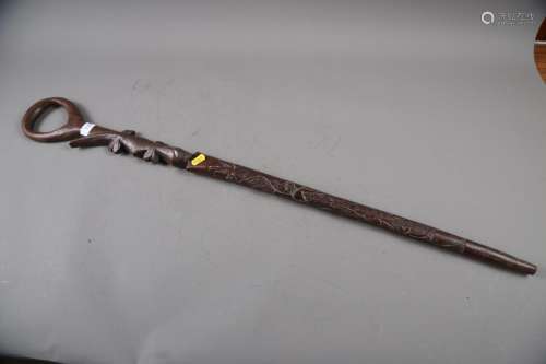 An African (Ghana?) carved ironwood walking stick with loop ...