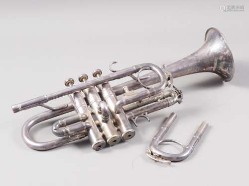 A Besson silver plated trumpet, in black and brown leather c...