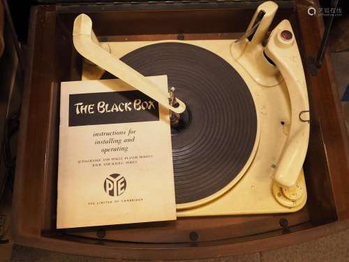 A wooden cased Pye record player and a large quantity of vin...