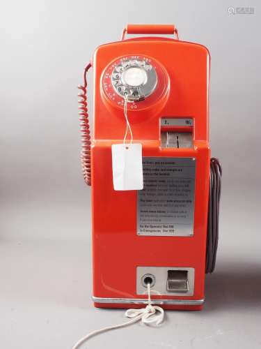 A 1960s telephone 735 portable combined coin box and telepho...