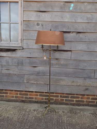 A brass two-light standard lamp, converted from a candelabra...