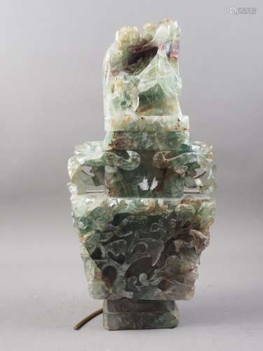 A Chinese carved fluorite two-handled vase with phoenix cove...