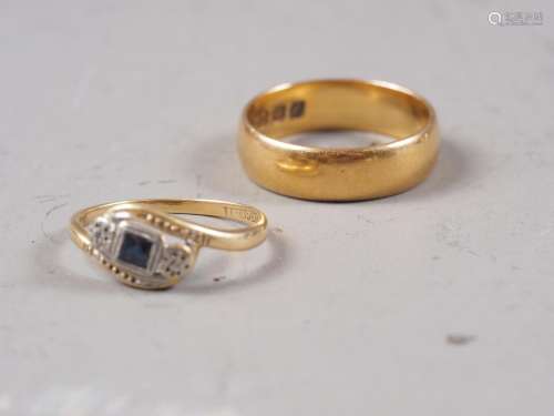 An 18ct gold, sapphire and diamond crossover ring, size J/K,...