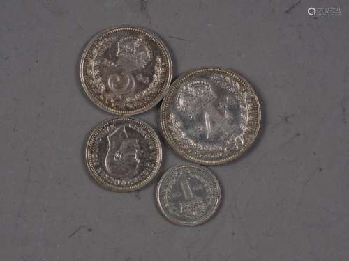 A 1944 Maundy money set and a small quantity of other coins