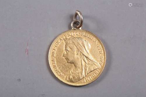 A gold sovereign, dated 1894 (hard mounted)
