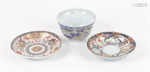 A Group of two Imari saucers and one blue and white with a g...